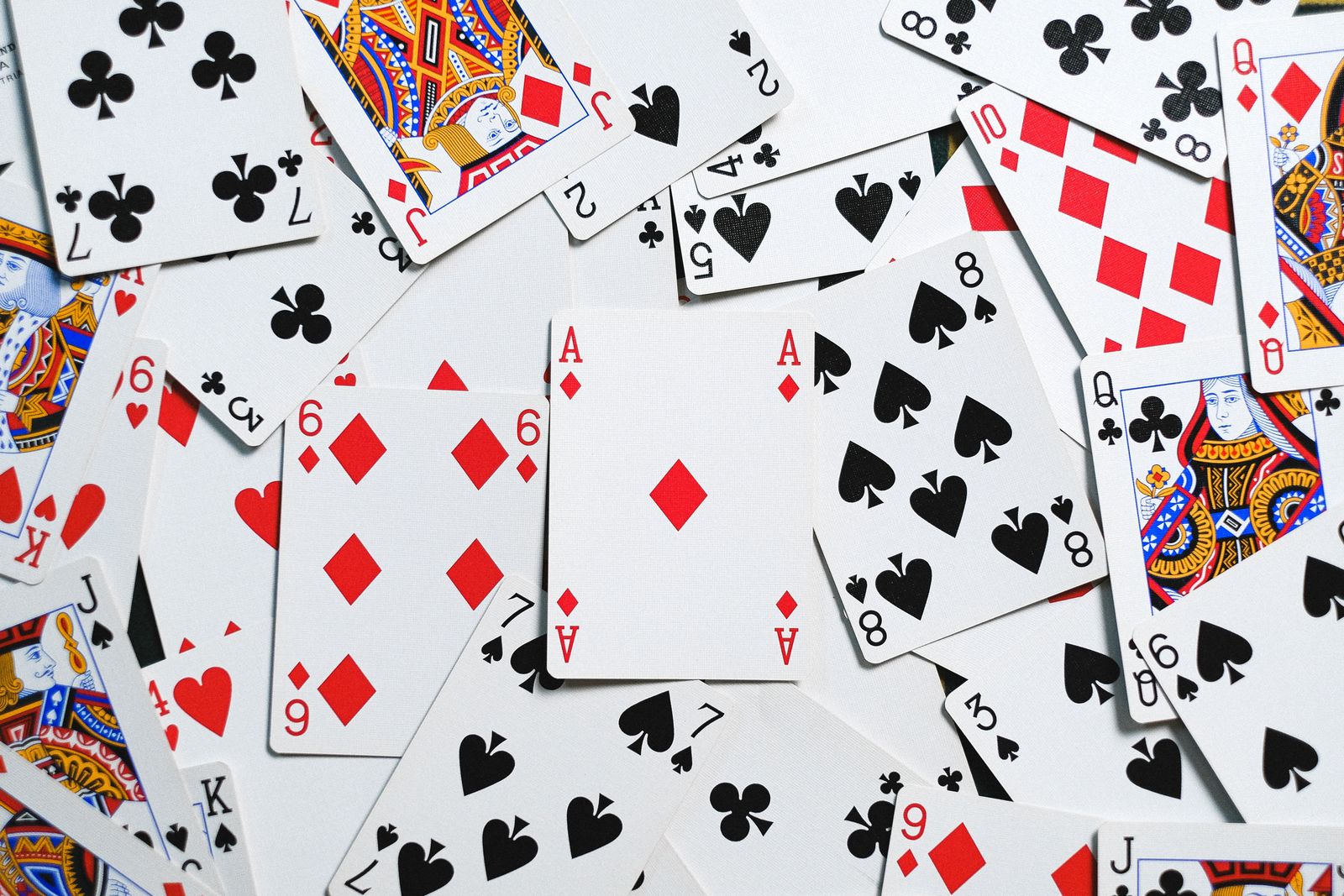Playing cards arranged across a casino table